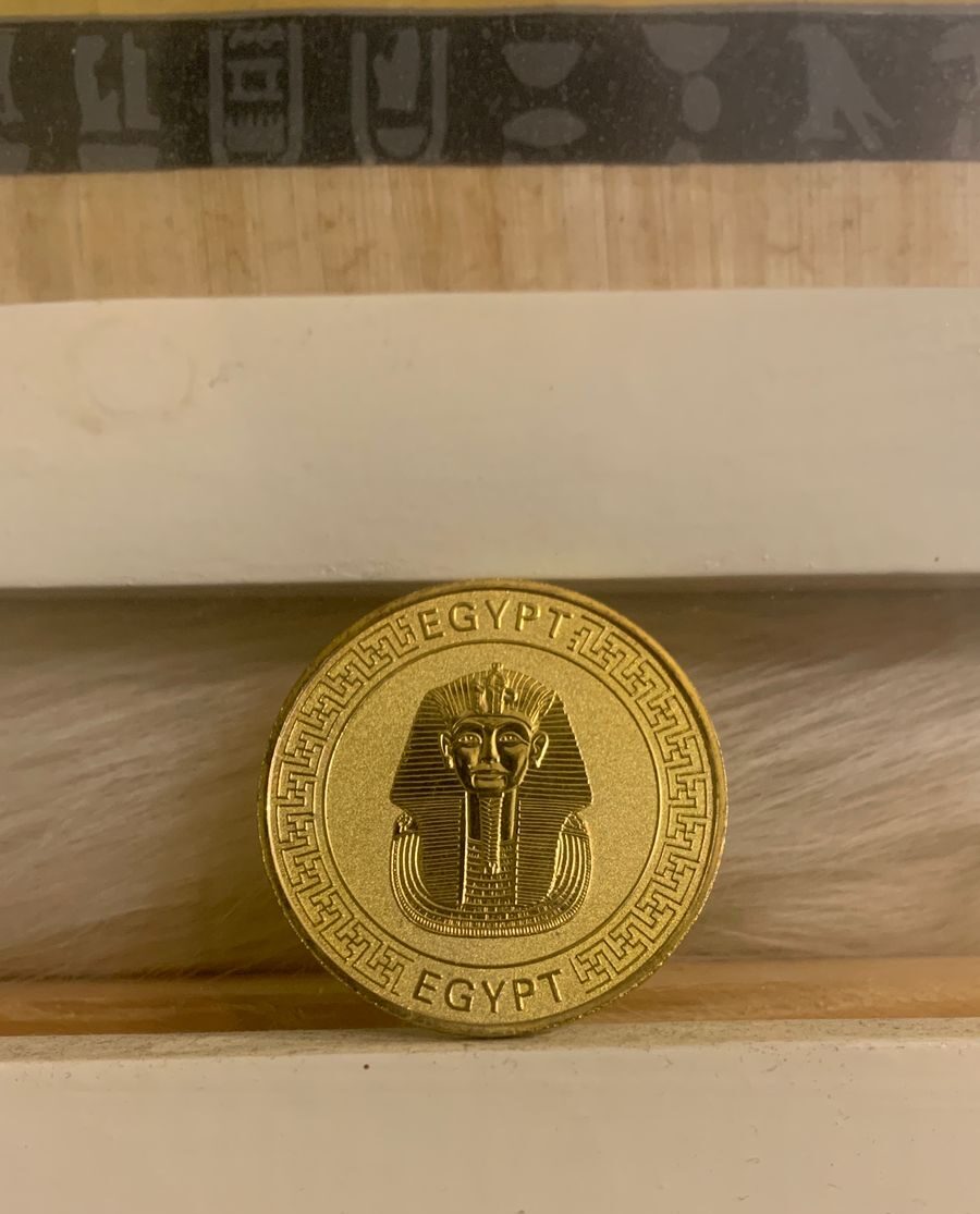 Gold Egypt pharaoh coin — front